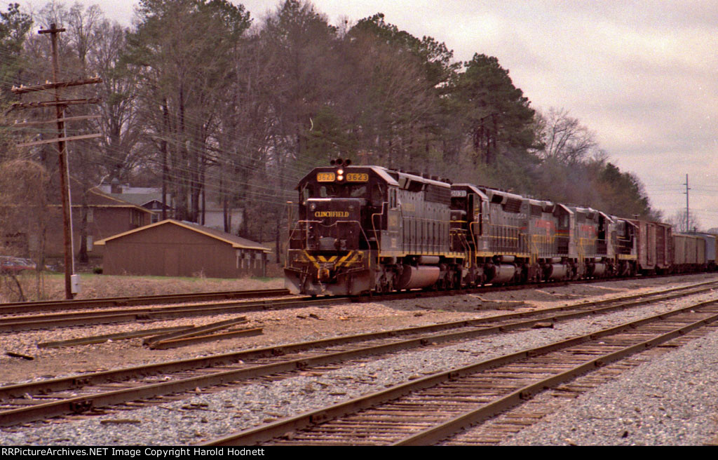 SBD 3623, still in Clinchfield paint, leads a train at the north end of the yard